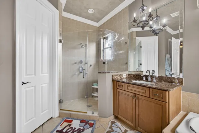 a front view of a house with a garden and a yard