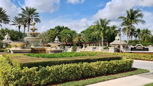 a view of a backyard patio and swimming pool