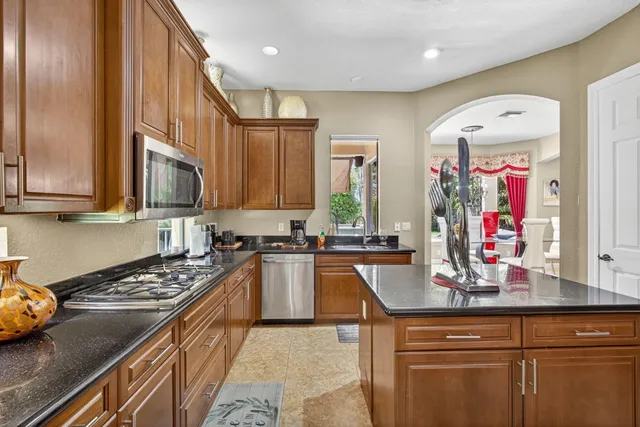 a view of a dining room with furniture window and outdoor view