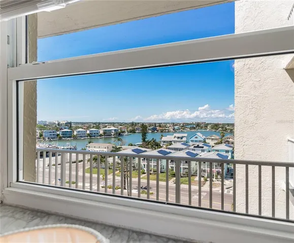 a view of a balcony with city