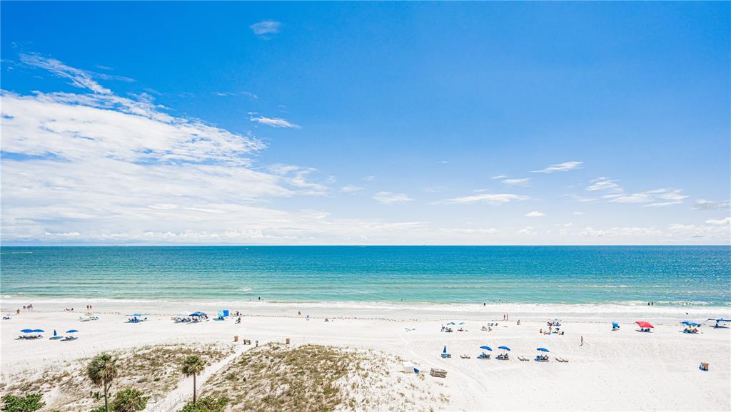 13500 Gulf Boulevard, Unit 602 Madeira Beach, FL 33708 - Photo 32 of 34 a view of an ocean beach