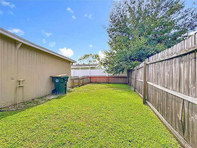 a view of a backyard with a garden