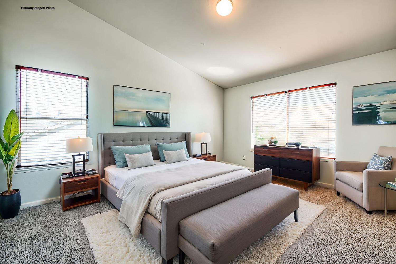 2836 Griffith Avenue Clovis, CA 93611 - Photo 21 of 41 a bedroom with a bed and a couch