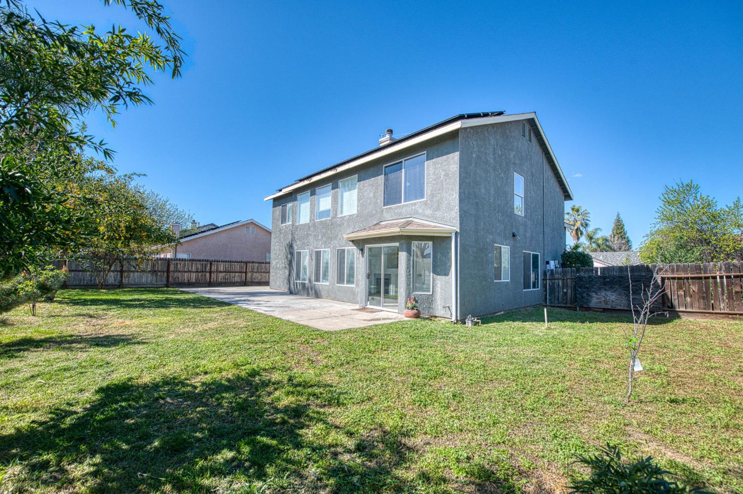 2836 Griffith Avenue Clovis, CA 93611 - Photo 34 of 41 a view of a house with a yard porch and sitting area