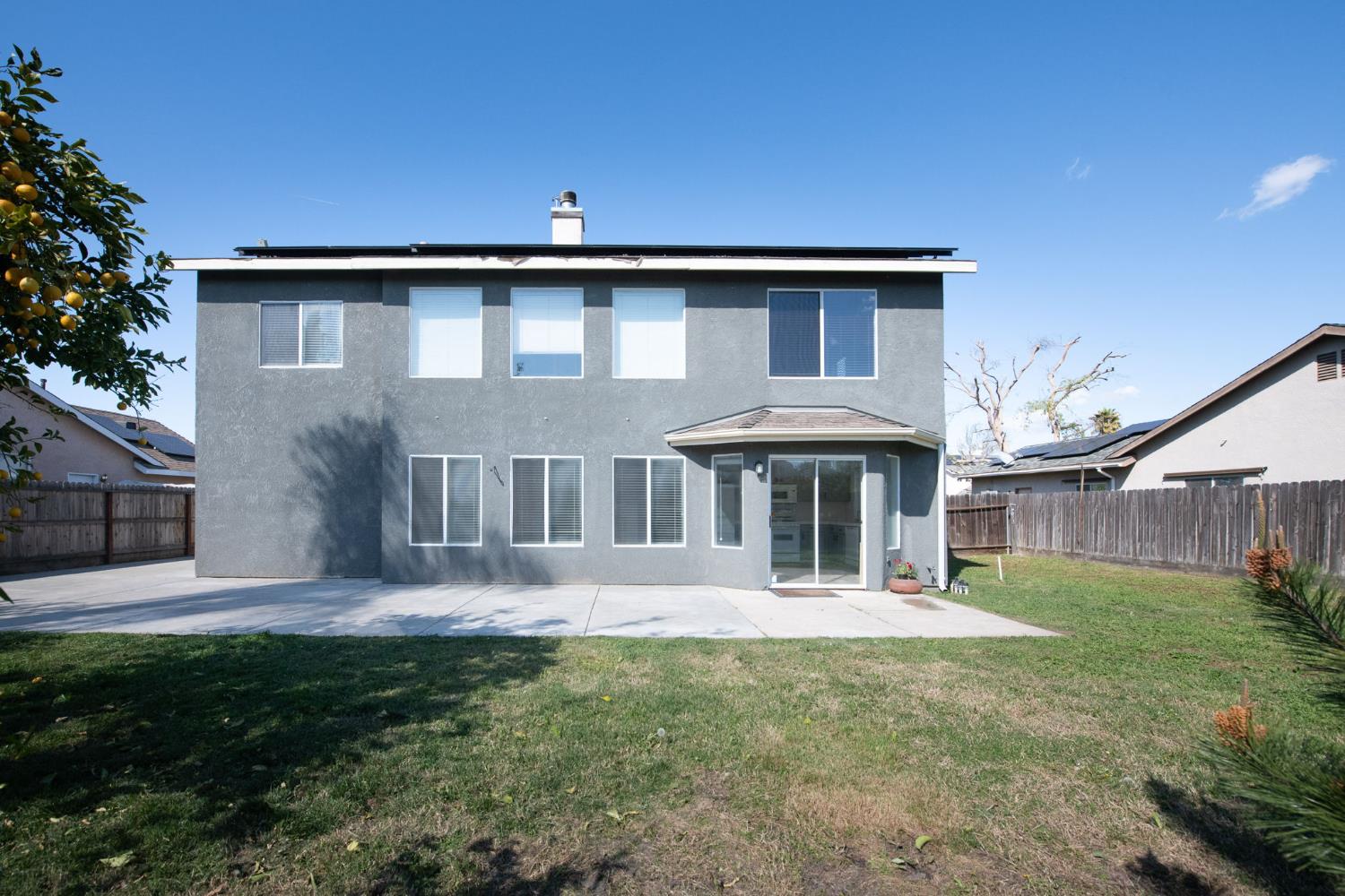 2836 Griffith Avenue Clovis, CA 93611 - Photo 35 of 41 a front view of a house with a yard