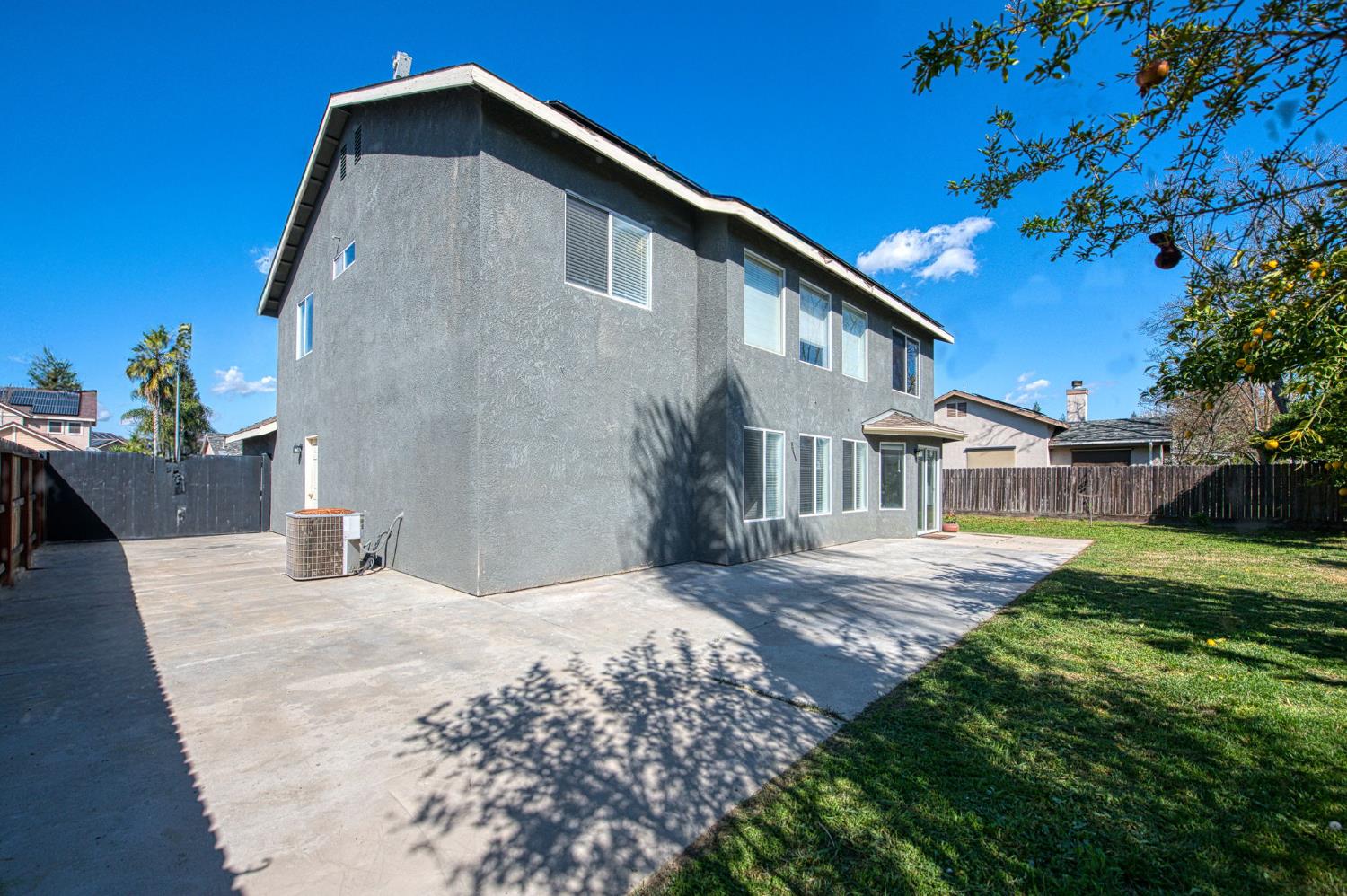 2836 Griffith Avenue Clovis, CA 93611 - Photo 37 of 41 a front view of a house with a yard