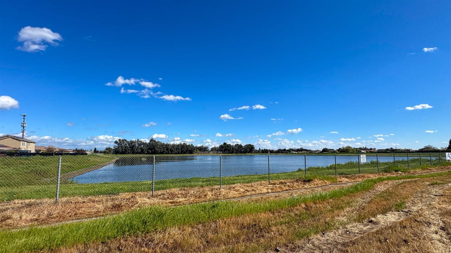2836 Griffith Avenue Clovis, CA 93611 - Photo 41 of 41 a view of a lake with a big yard