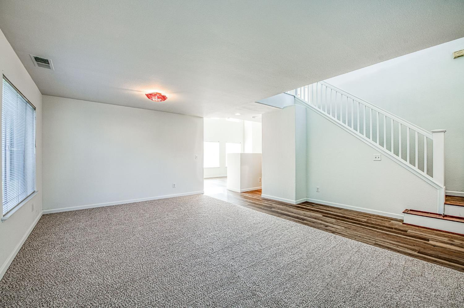 2836 Griffith Avenue Clovis, CA 93611 - Photo 8 of 41 a view of an empty room with a window