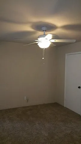 a view of a room with an empty space