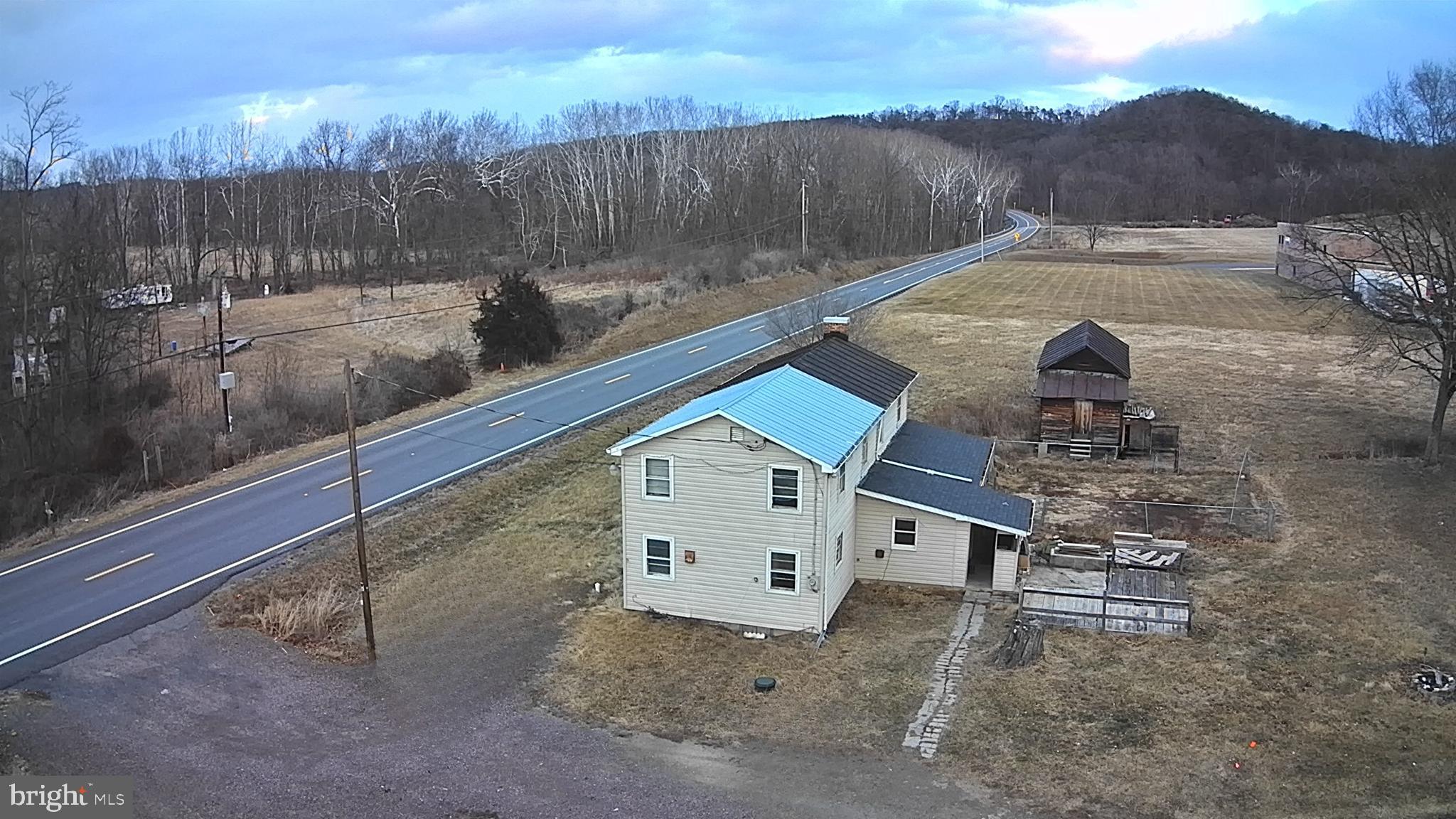 Right Side View with Gravel Driveway