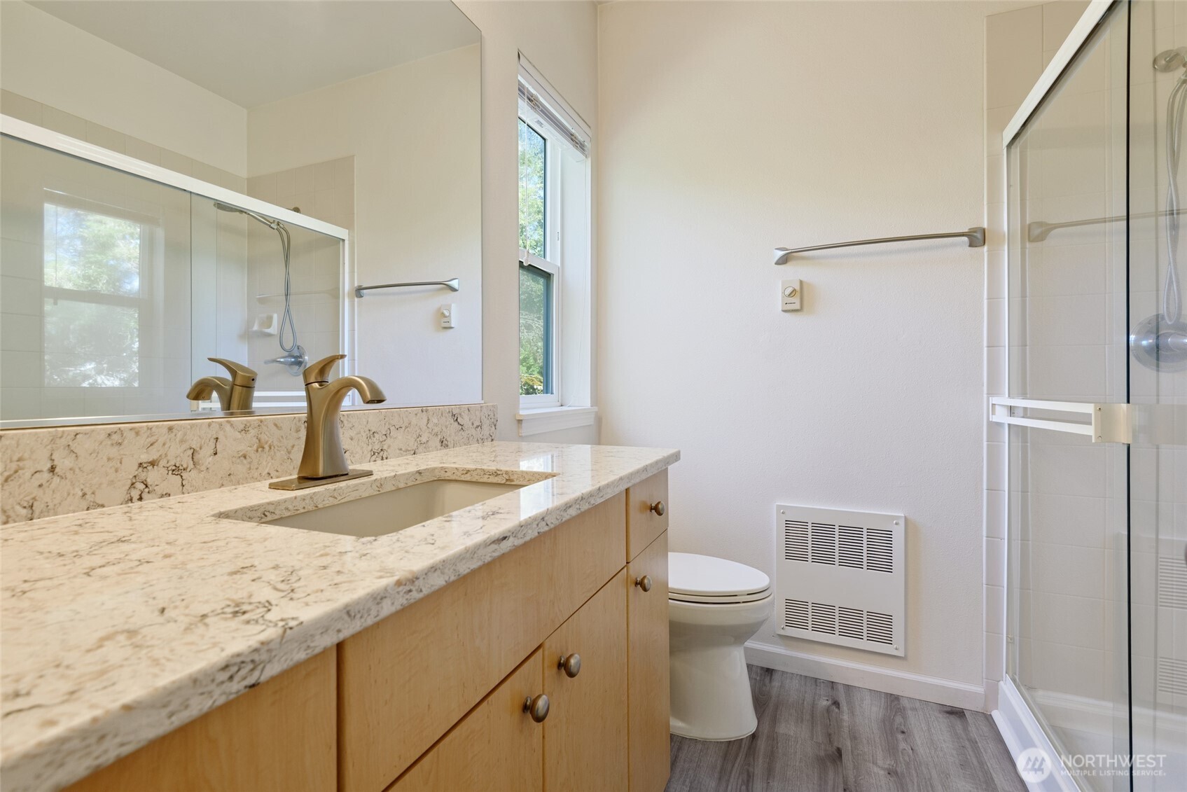 5001 Davis Place South, Unit A Renton, WA 98055 - Photo 14 of 24 a bathroom with a granite countertop sink toilet and shower