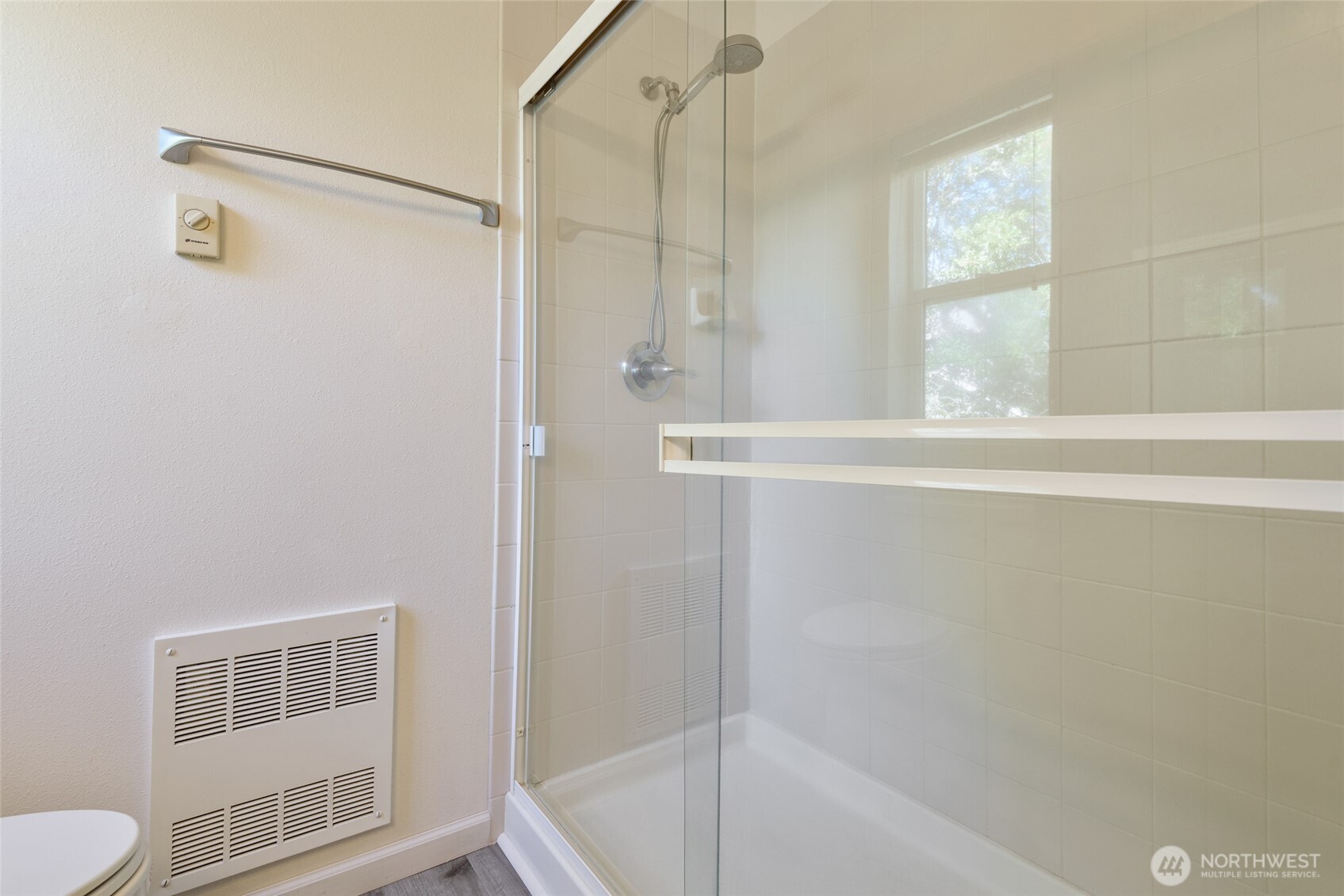 5001 Davis Place South, Unit A Renton, WA 98055 - Photo 15 of 24 a bathroom with a shower and a toilet