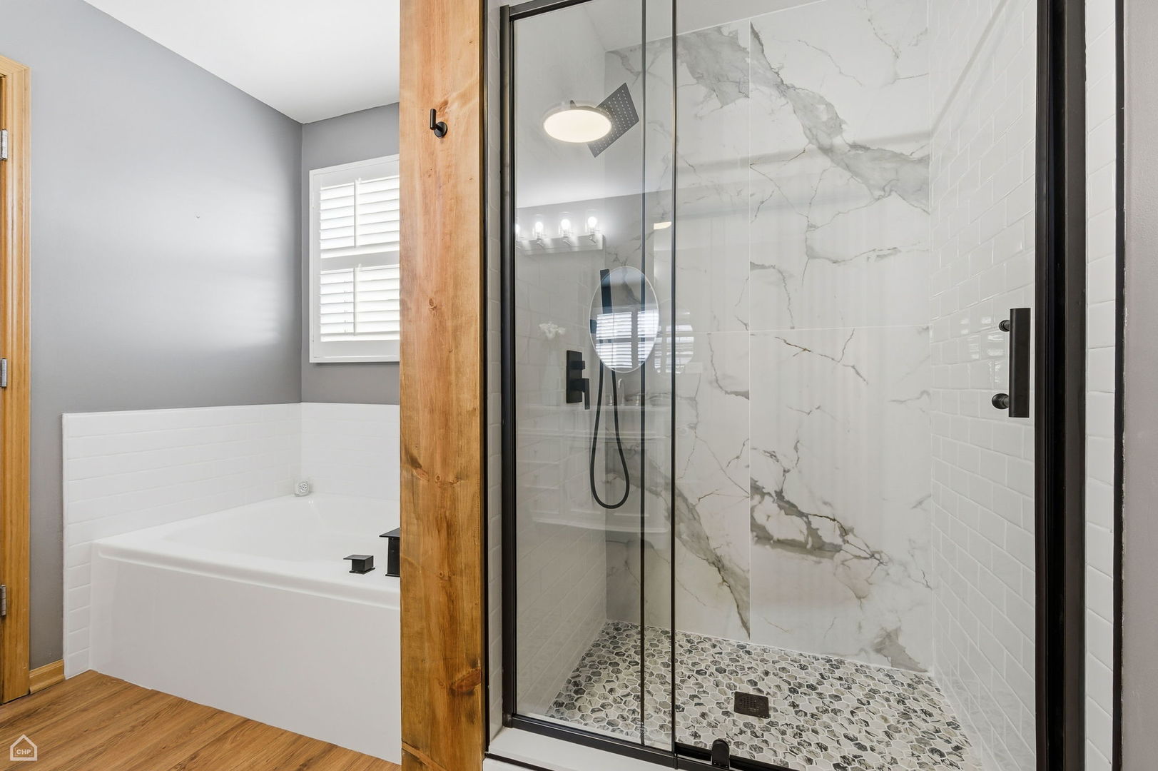 16353 Celtic Circle Manhattan, IL 60442 - Photo 12 of 23 a bathroom with a bathtub and shower