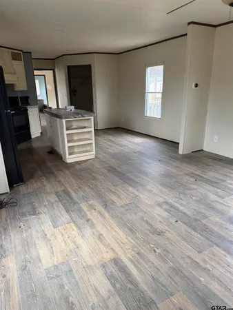 a view of livingroom with hardwood floor and window