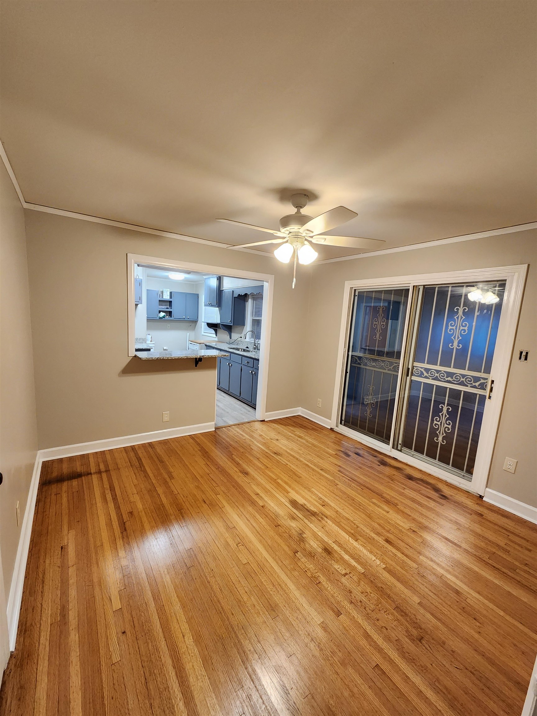 4624 Willow Road Memphis, TN 38117 - Photo 14 of 14 a bedroom with a bed and painting on the wall