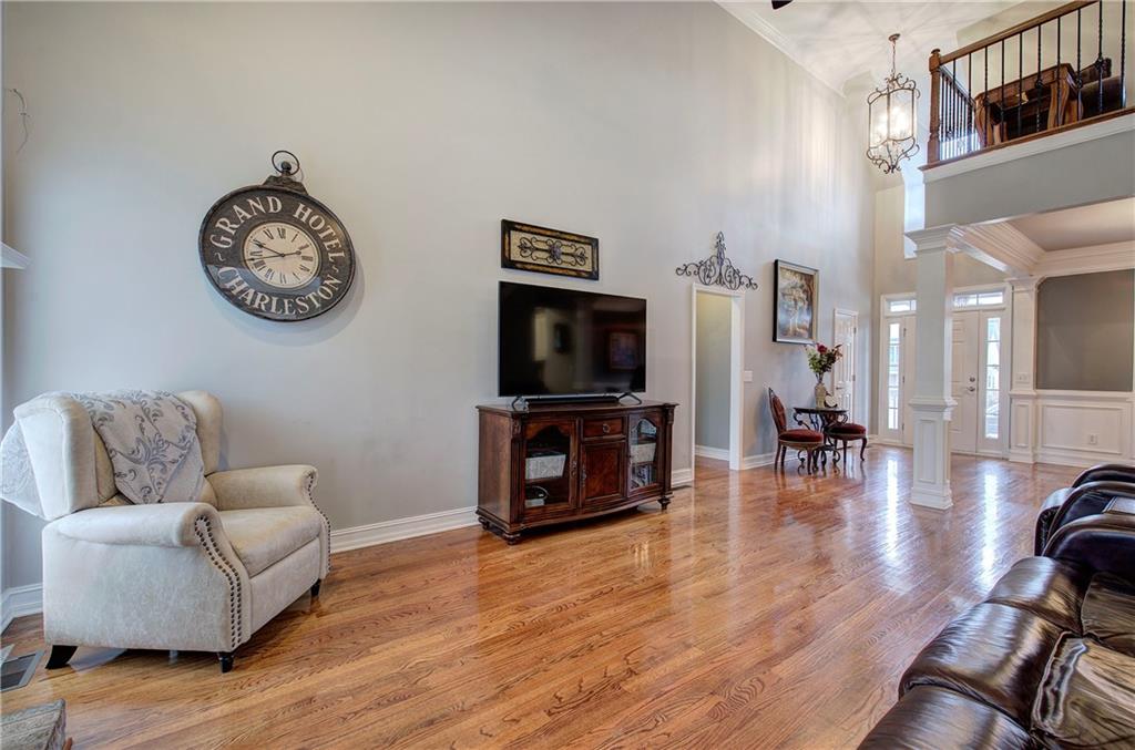 57 Colonial Circle Northwest Cartersville, GA 30120 - Photo 11 of 45 a living room with furniture and a flat screen tv