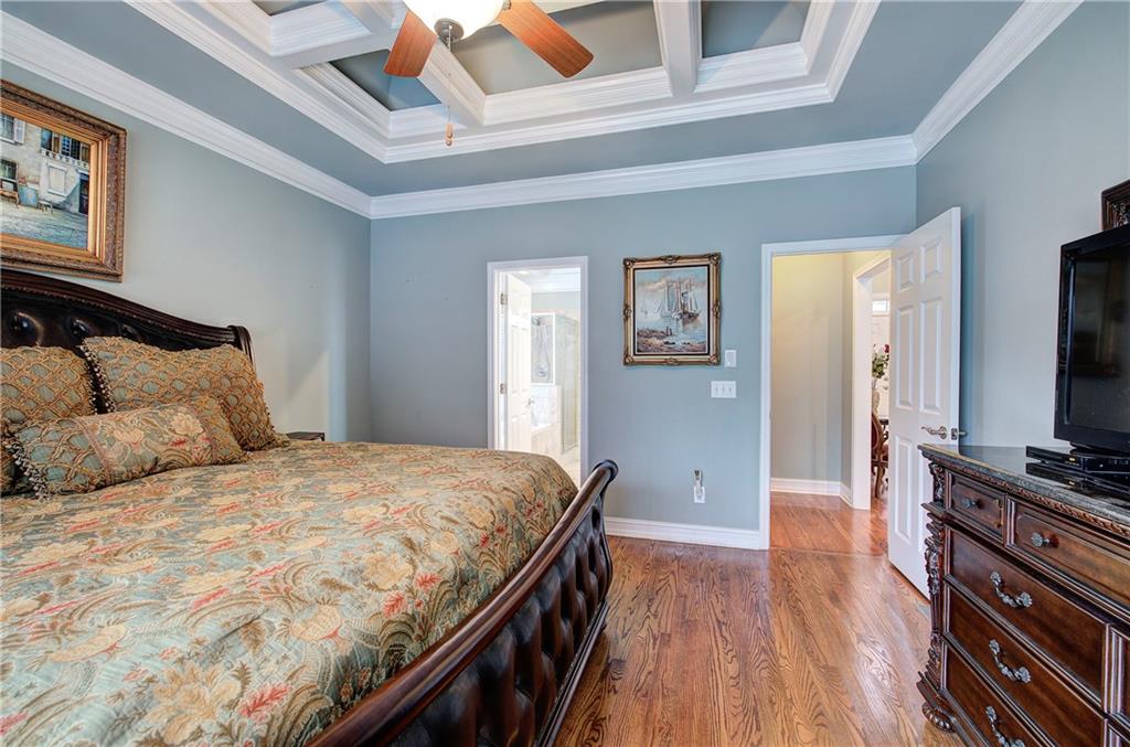 57 Colonial Circle Northwest Cartersville, GA 30120 - Photo 22 of 45 a bedroom with a bed and a flat screen tv