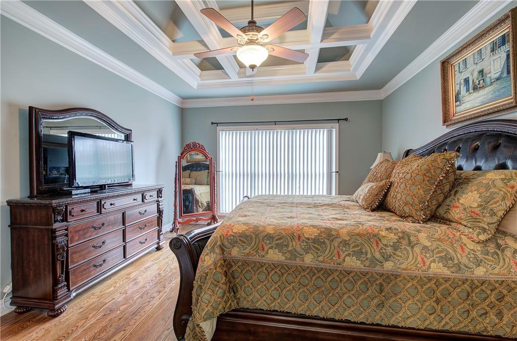 57 Colonial Circle Northwest Cartersville, GA 30120 - Photo 23 of 45 a bedroom with a bed and a flat screen tv