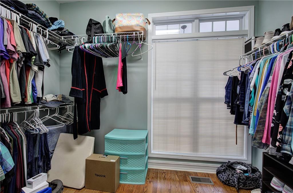 57 Colonial Circle Northwest Cartersville, GA 30120 - Photo 28 of 45 a view of walk in closet with clothes and shoes