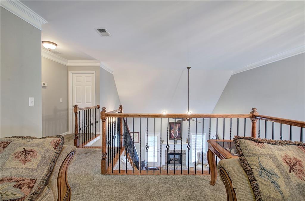 57 Colonial Circle Northwest Cartersville, GA 30120 - Photo 30 of 45 a bedroom with a bed and a window