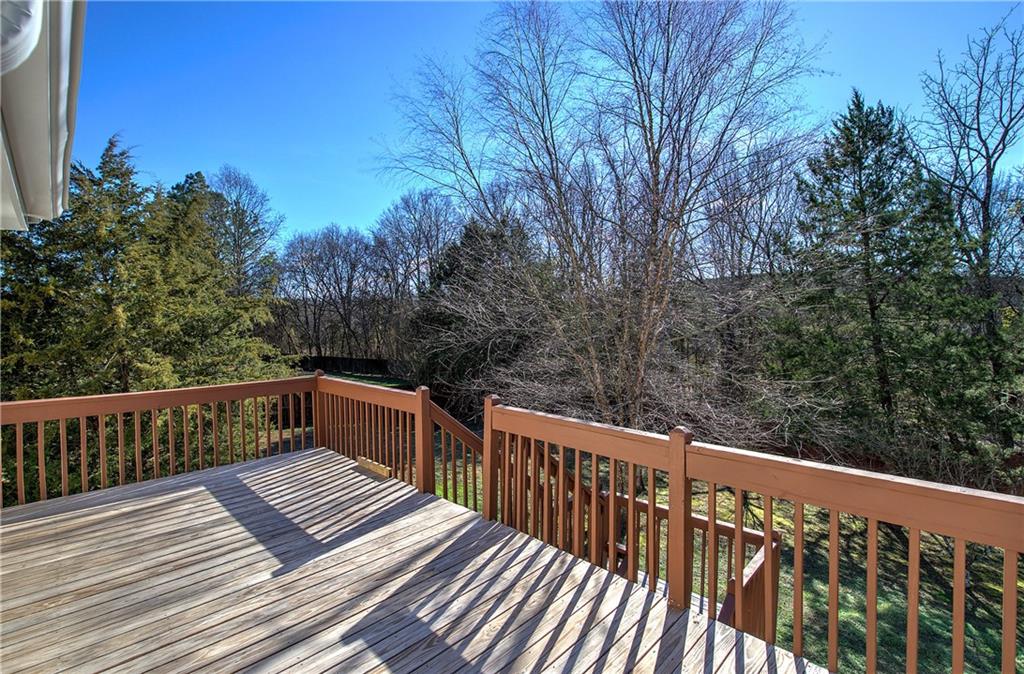 57 Colonial Circle Northwest Cartersville, GA 30120 - Photo 39 of 45 a view of balcony with wooden deck and trees