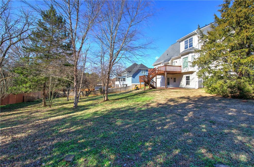 57 Colonial Circle Northwest Cartersville, GA 30120 - Photo 42 of 45 a view of a house with a yard