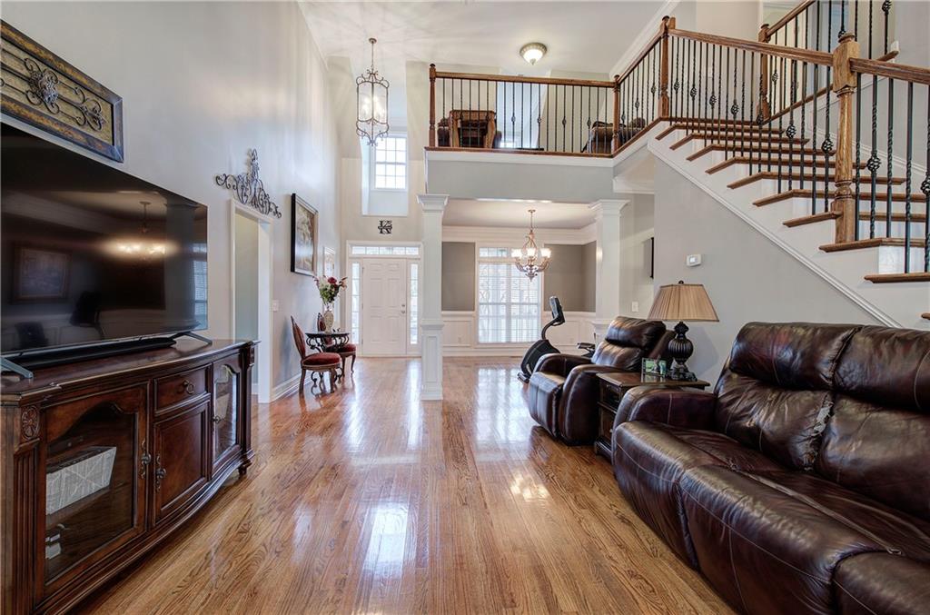 57 Colonial Circle Northwest Cartersville, GA 30120 - Photo 10 of 45 a living room with furniture and a flat screen tv