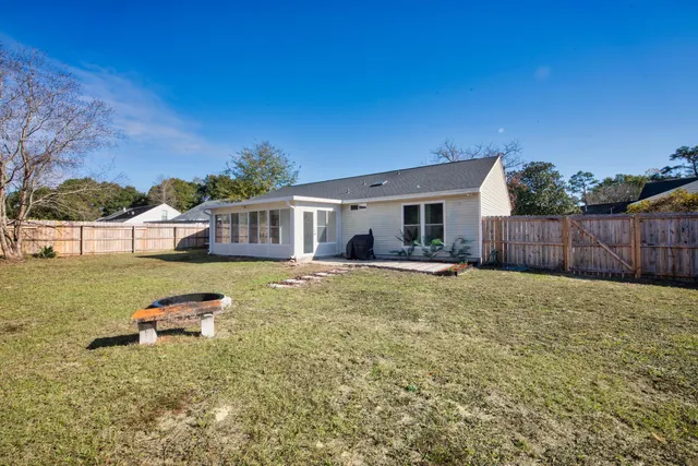a house with trees in front of it