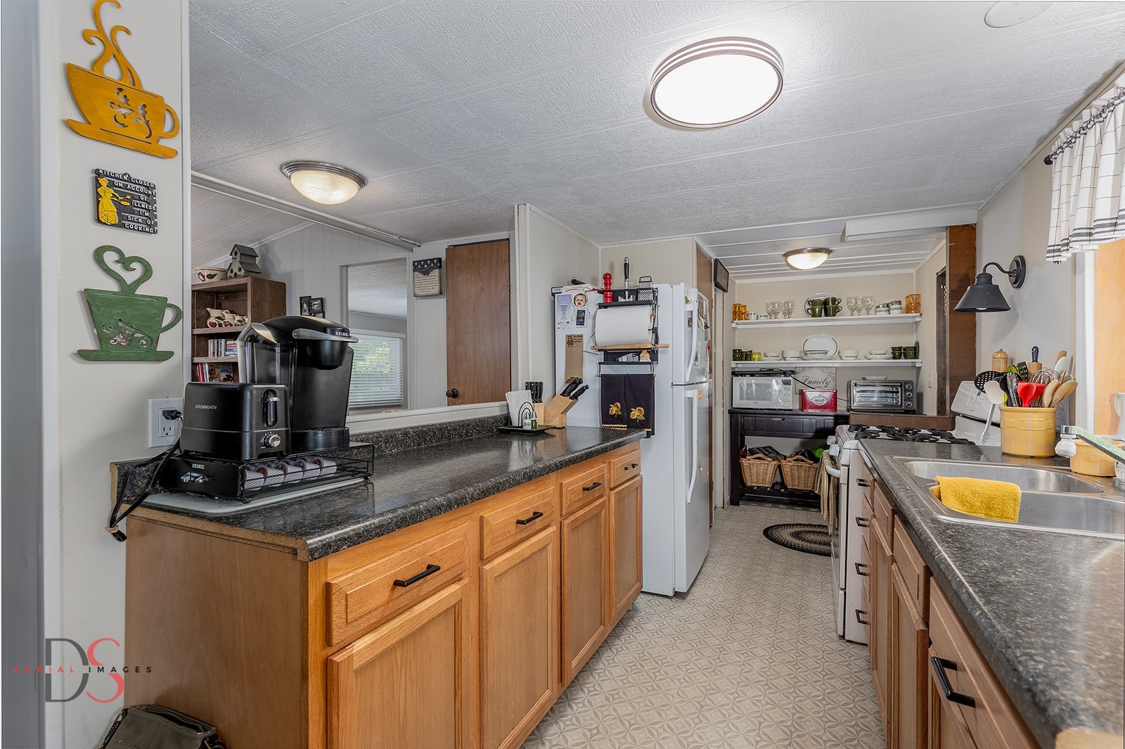 1906 North 2959th Road Ottawa, IL 61350 - Photo 10 of 28 a kitchen with lots of counter top space and appliances