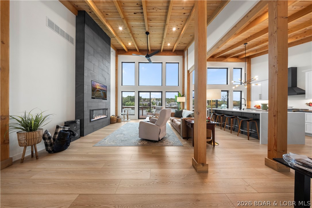 Stunning open-concept living area with soaring cei