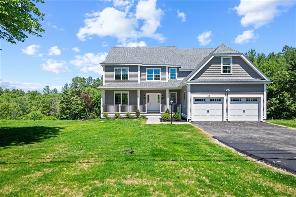 Lot 2 Sandersdale Road Charlton, MA 01507 - Photo 41 of 42 a front view of a house with a yard