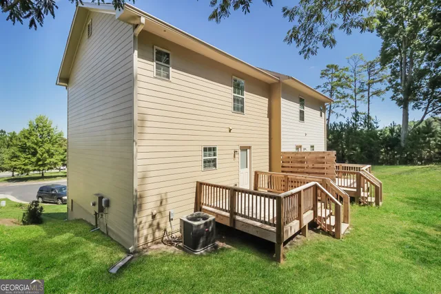 a view of a chair and table in the yard