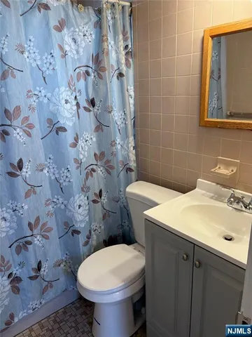 a bathroom with a sink and toilet