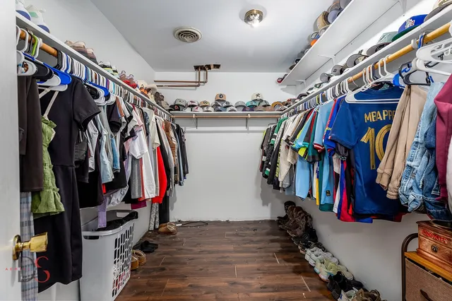 a room with furniture and a flat screen tv