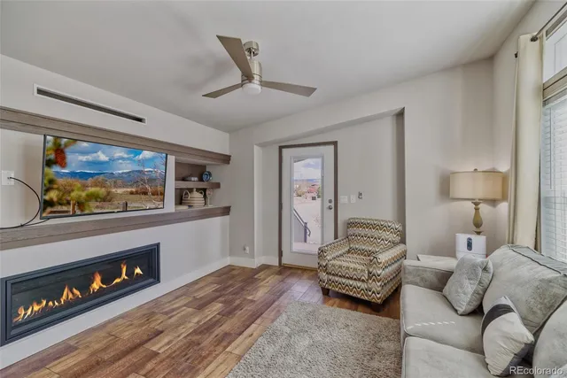 a large kitchen with a table and chairs