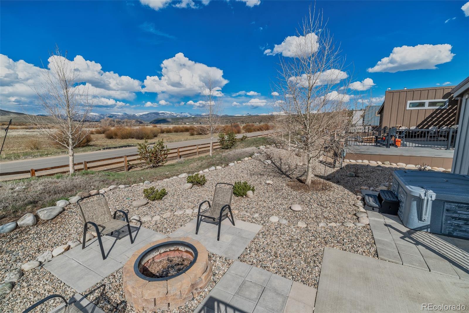 1051 Summit Trail Granby, CO 80446 - Photo 25 of 50 a table with wine bottles and sink on it