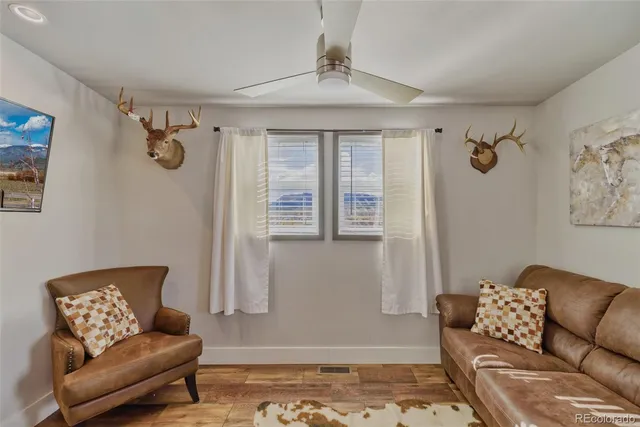 a bedroom with furniture and a couch