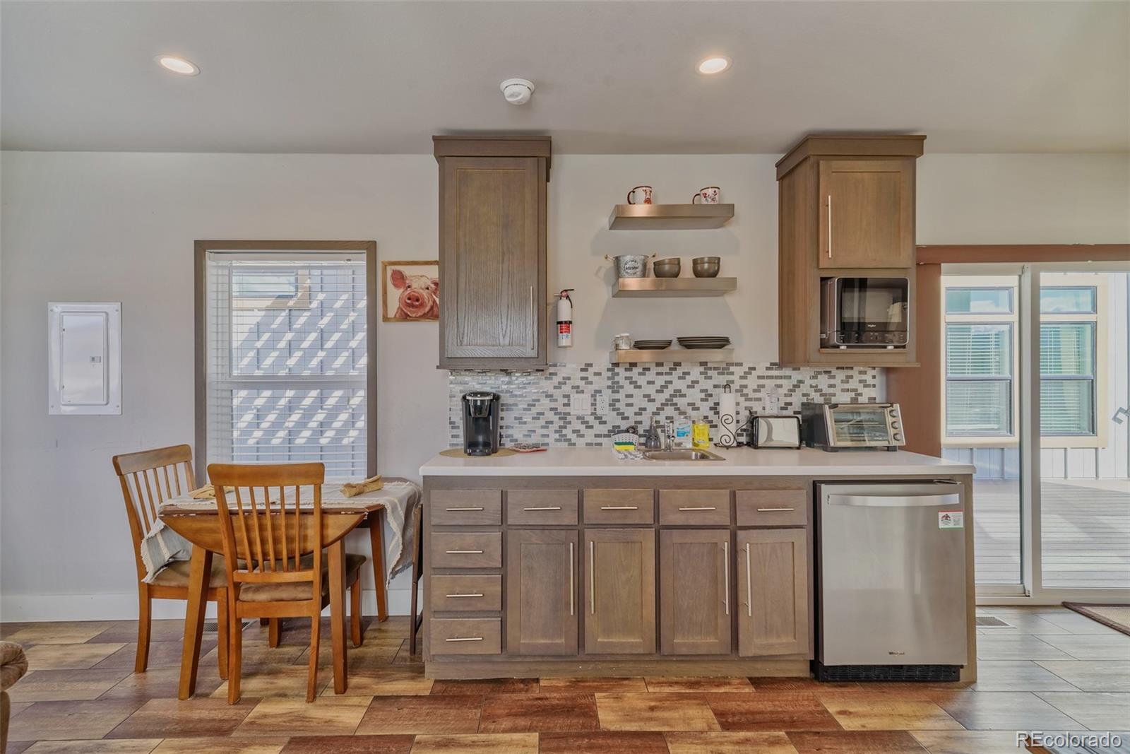 1051 Summit Trail Granby, CO 80446 - Photo 36 of 50 a dining room with furniture and window