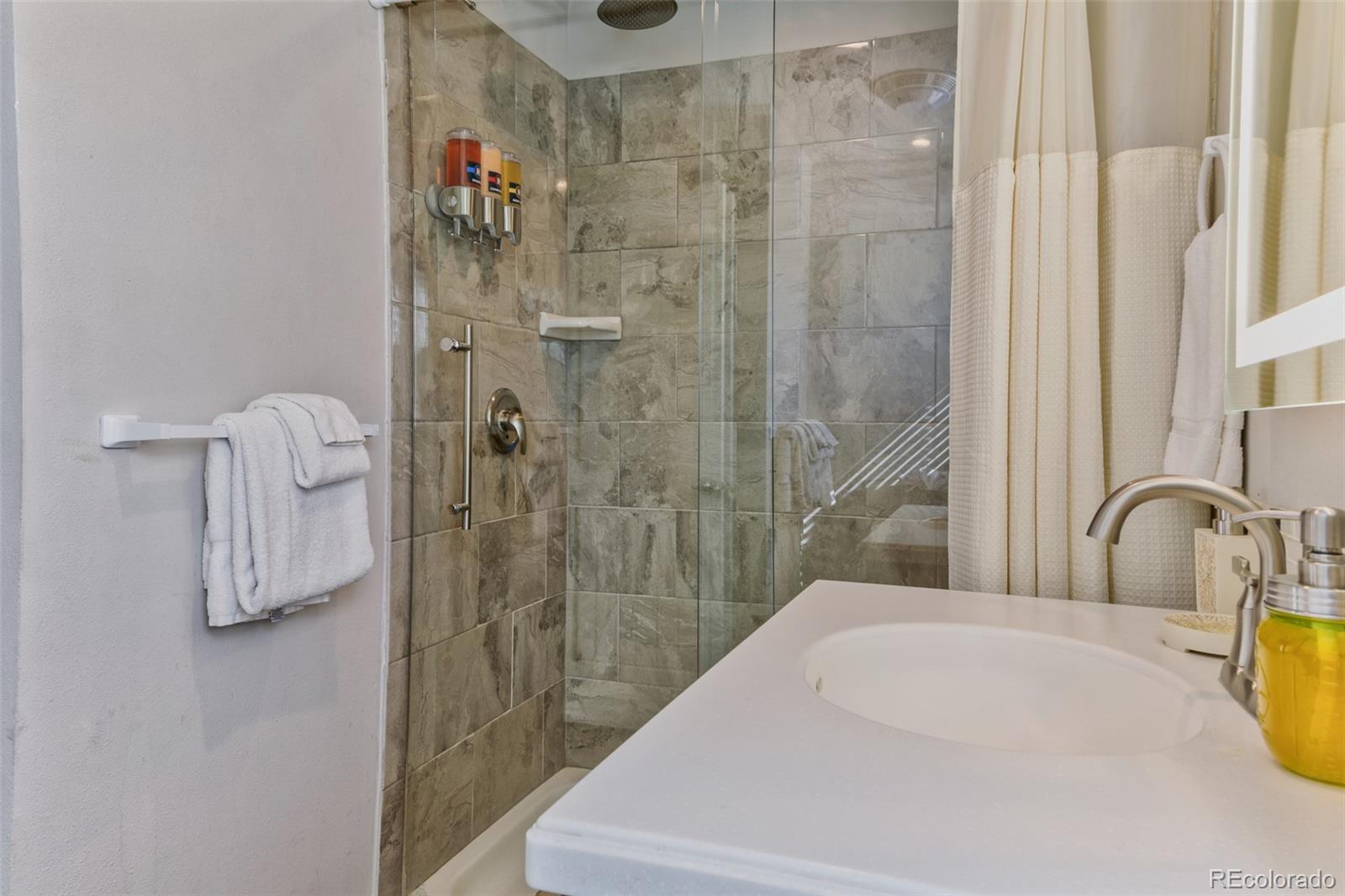 1051 Summit Trail Granby, CO 80446 - Photo 42 of 50 a bathroom with a bathtub and shower