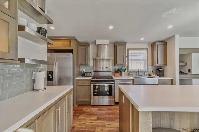 a kitchen with a sink cabinets and microwave