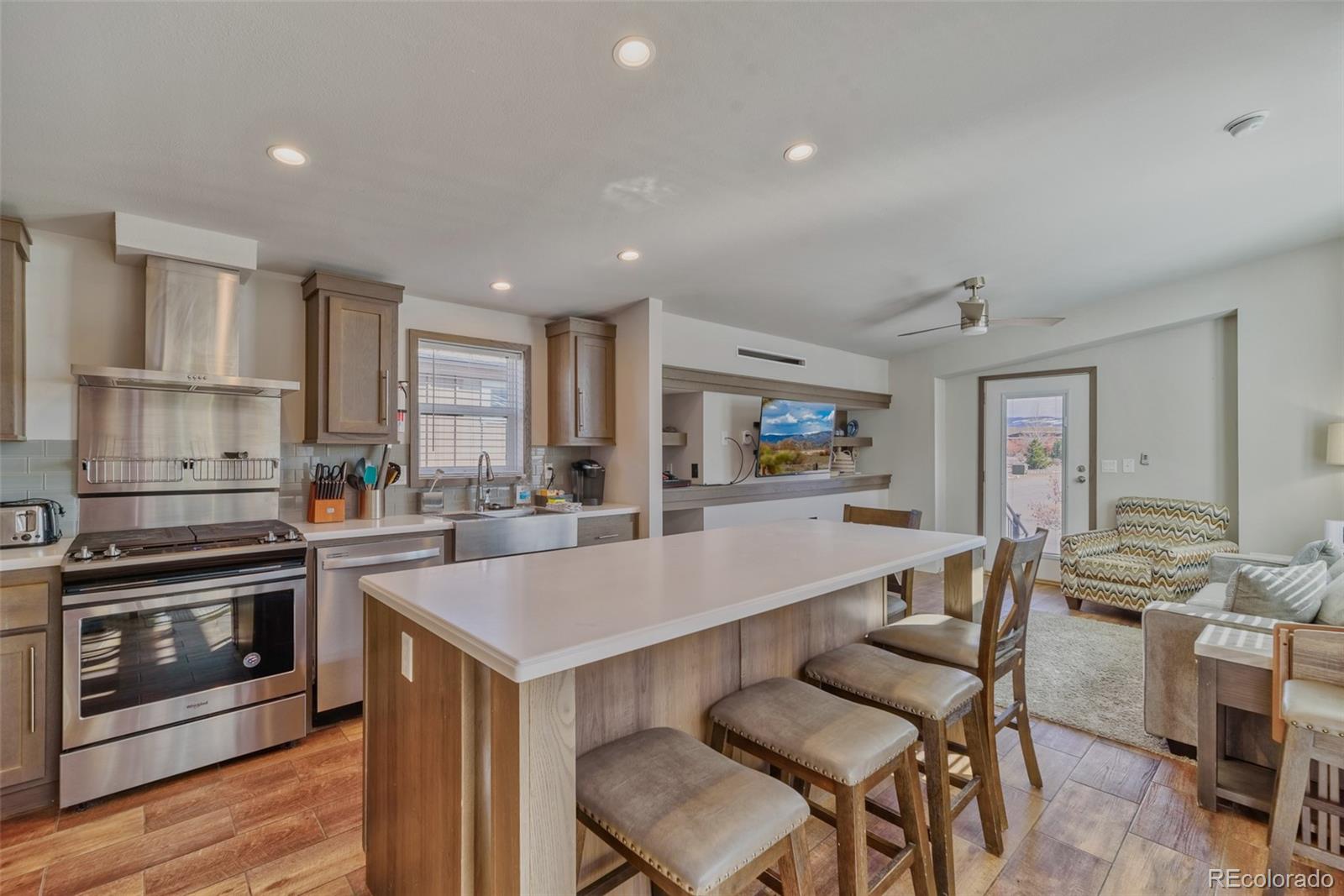 1051 Summit Trail Granby, CO 80446 - Photo 10 of 50 a large kitchen with a table and chairs