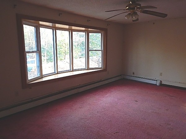 80 Brooks Village Road Phillipston, MA 01331 - Photo 11 of 16 an empty room with a window