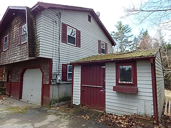 80 Brooks Village Road Phillipston, MA 01331 - Photo 3 of 16 a front view of a house with garage