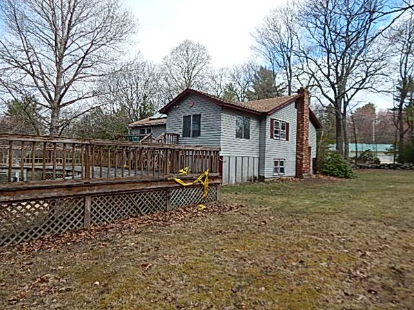 80 Brooks Village Road Phillipston, MA 01331 - Photo 5 of 16 a view of a house with a wooden fence
