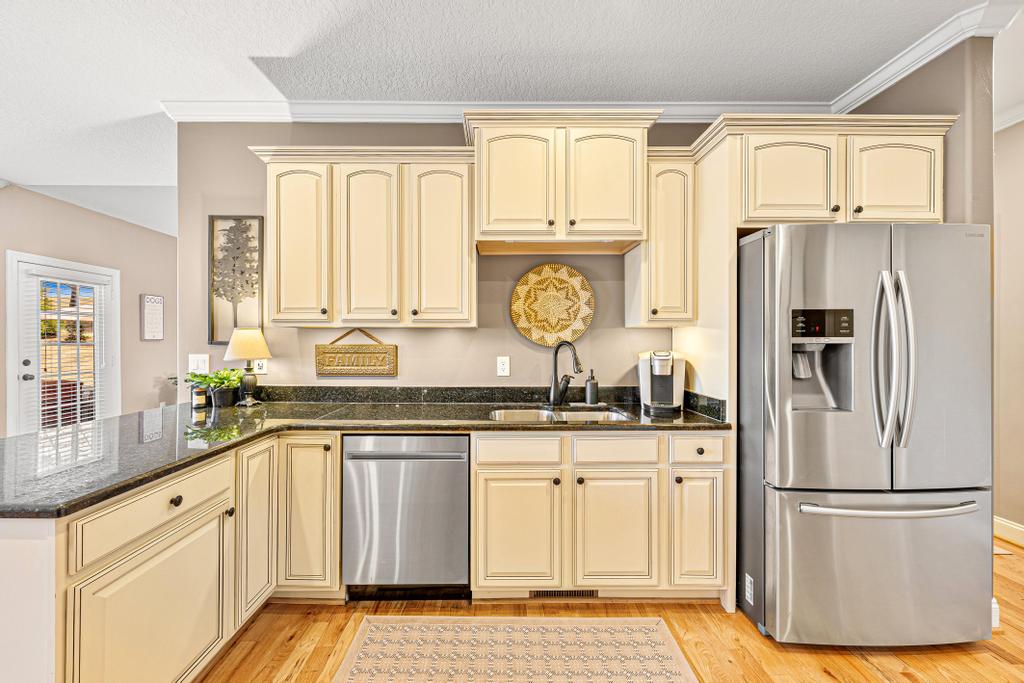 604 Feathery Lane Seneca, SC 29678 - Photo 11 of 44 This functional kitchen features ample counter space, stainless steel appliances, and durable flooring.