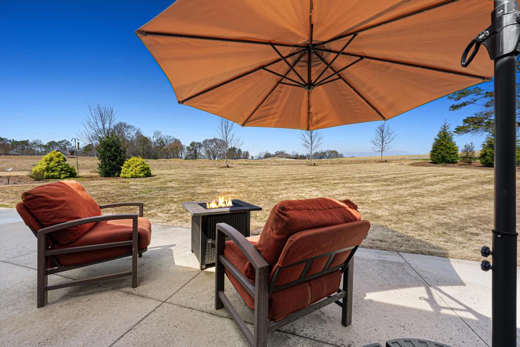 604 Feathery Lane Seneca, SC 29678 - Photo 32 of 44 This serene patio offers an inviting outdoor retreat, perfect for relaxation and gathering.