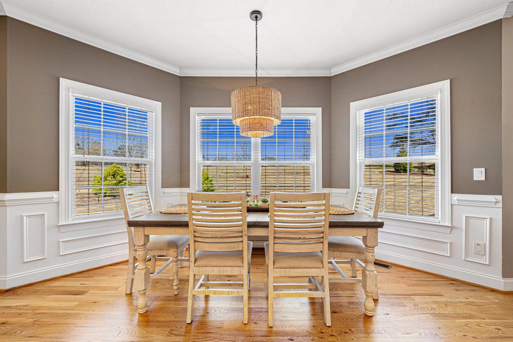 604 Feathery Lane Seneca, SC 29678 - Photo 9 of 44 This bright dining room features beautiful hardwood floors and ample natural light.