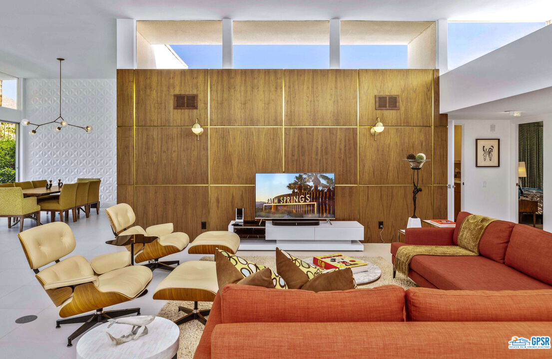 2649 Kings Road West Palm Springs, CA 92264 - Photo 11 of 50 a projector room with a couch and a table