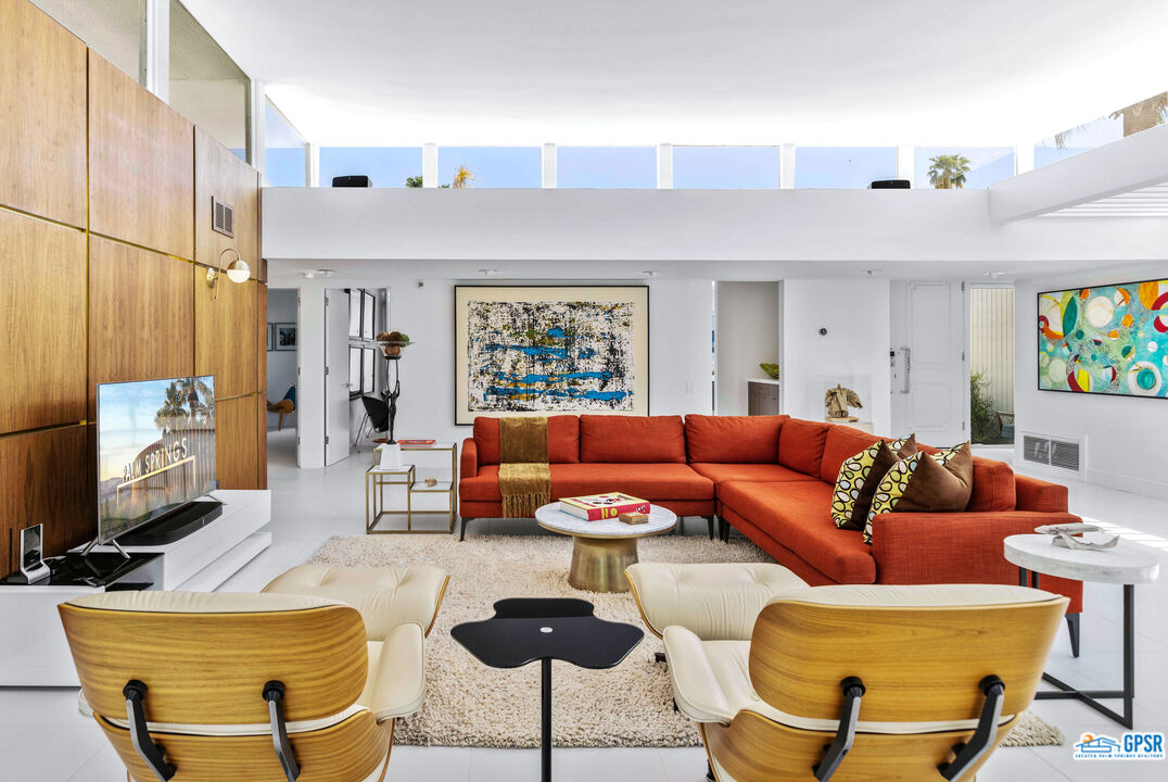 2649 Kings Road West Palm Springs, CA 92264 - Photo 12 of 50 a living room with furniture and a flat screen tv