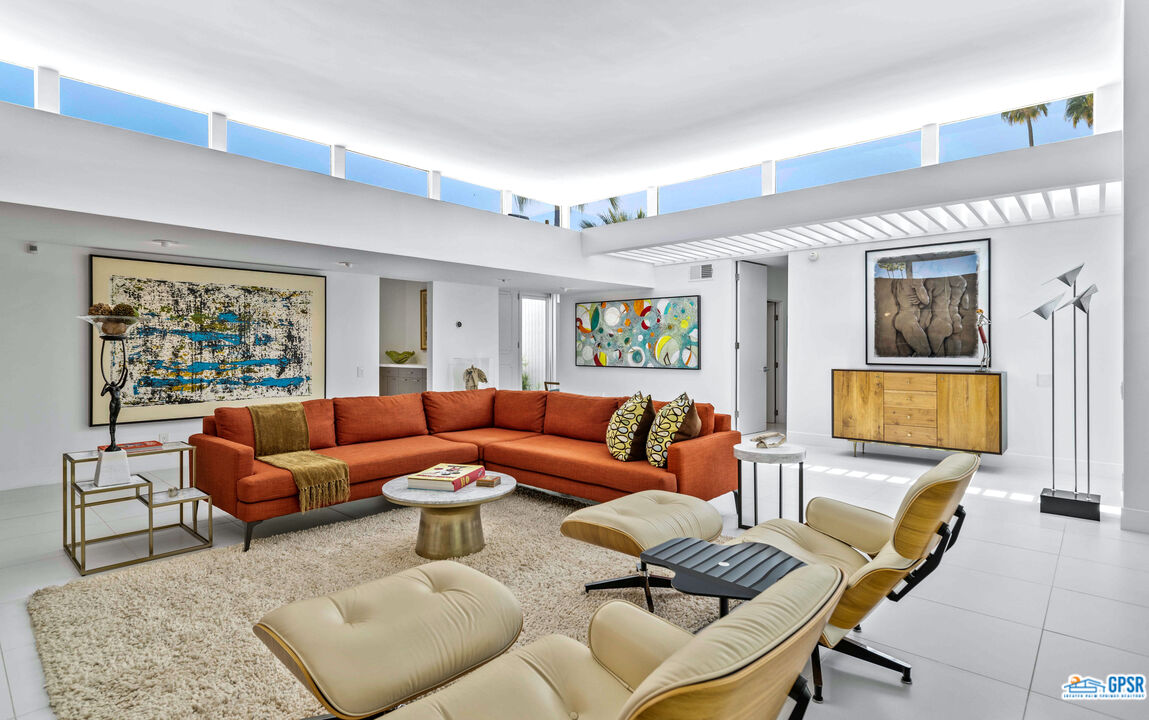 2649 Kings Road West Palm Springs, CA 92264 - Photo 13 of 50 a living room with furniture and a flat screen tv